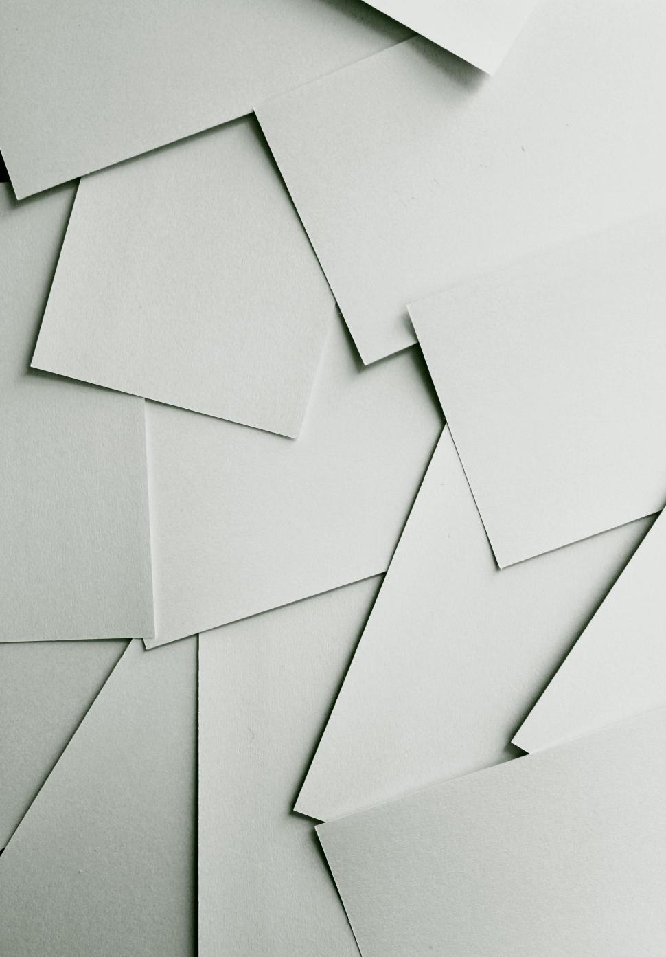 Free Image of Organized Stack of Papers on Desk 