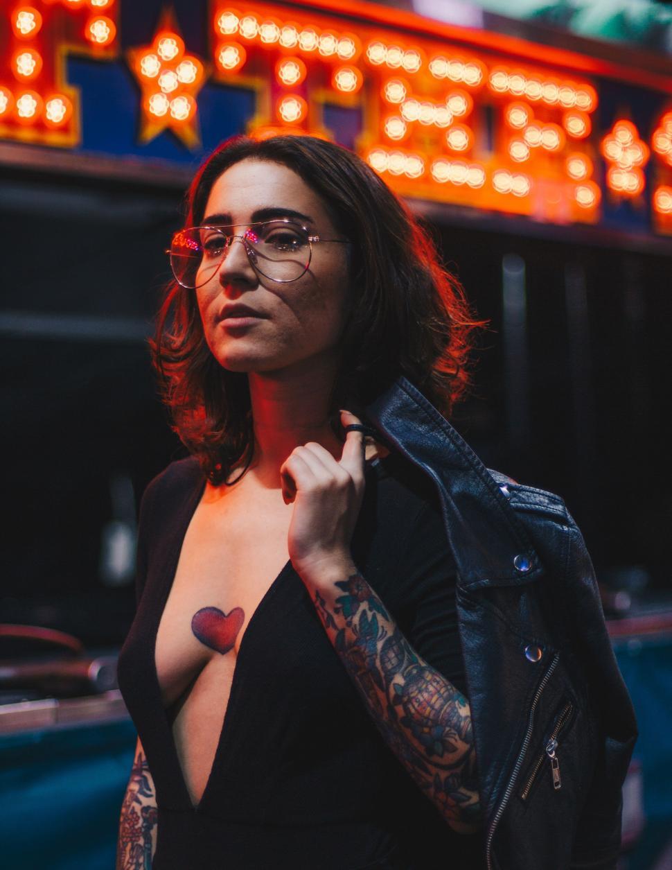 Free Image of Woman Wearing Glasses and Leather Jacket 