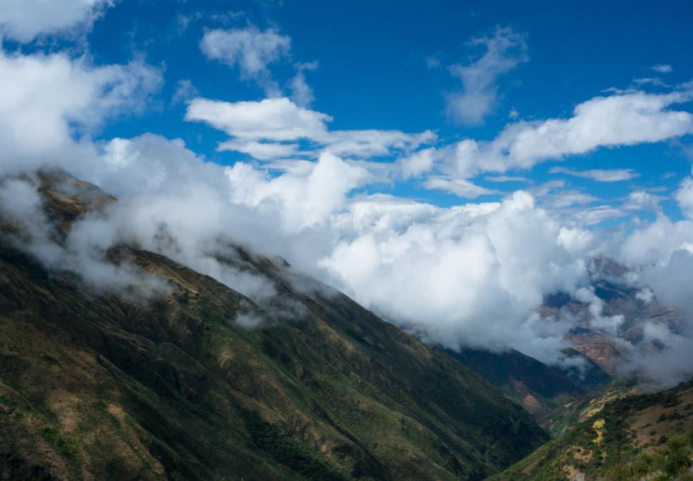 Free Image of Majestic Mountain Range With Clouds 