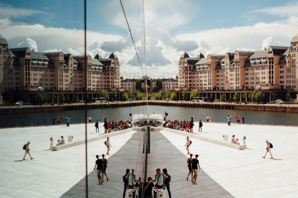 Free Image of Large Group of People Walking Around a City 