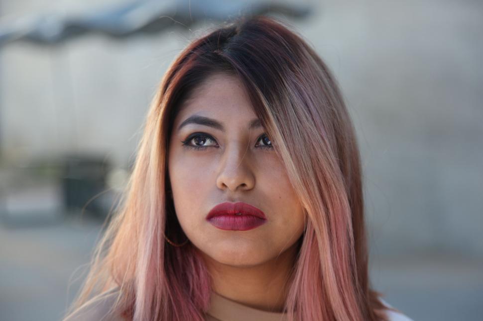 Free Image of Close Up of a Person With Pink Hair 