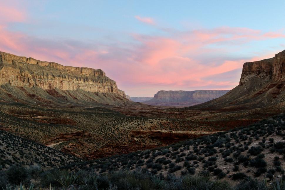 Free Image of Majestic Mountain Range Under Pink Sky 
