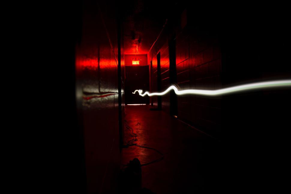 Free Image of Blurry Red Light in the Dark 