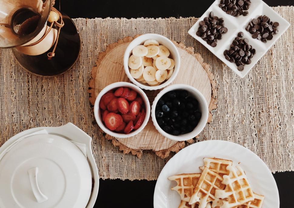 Free Image of Table Set With Plates of Food and Bowls of Fruit 