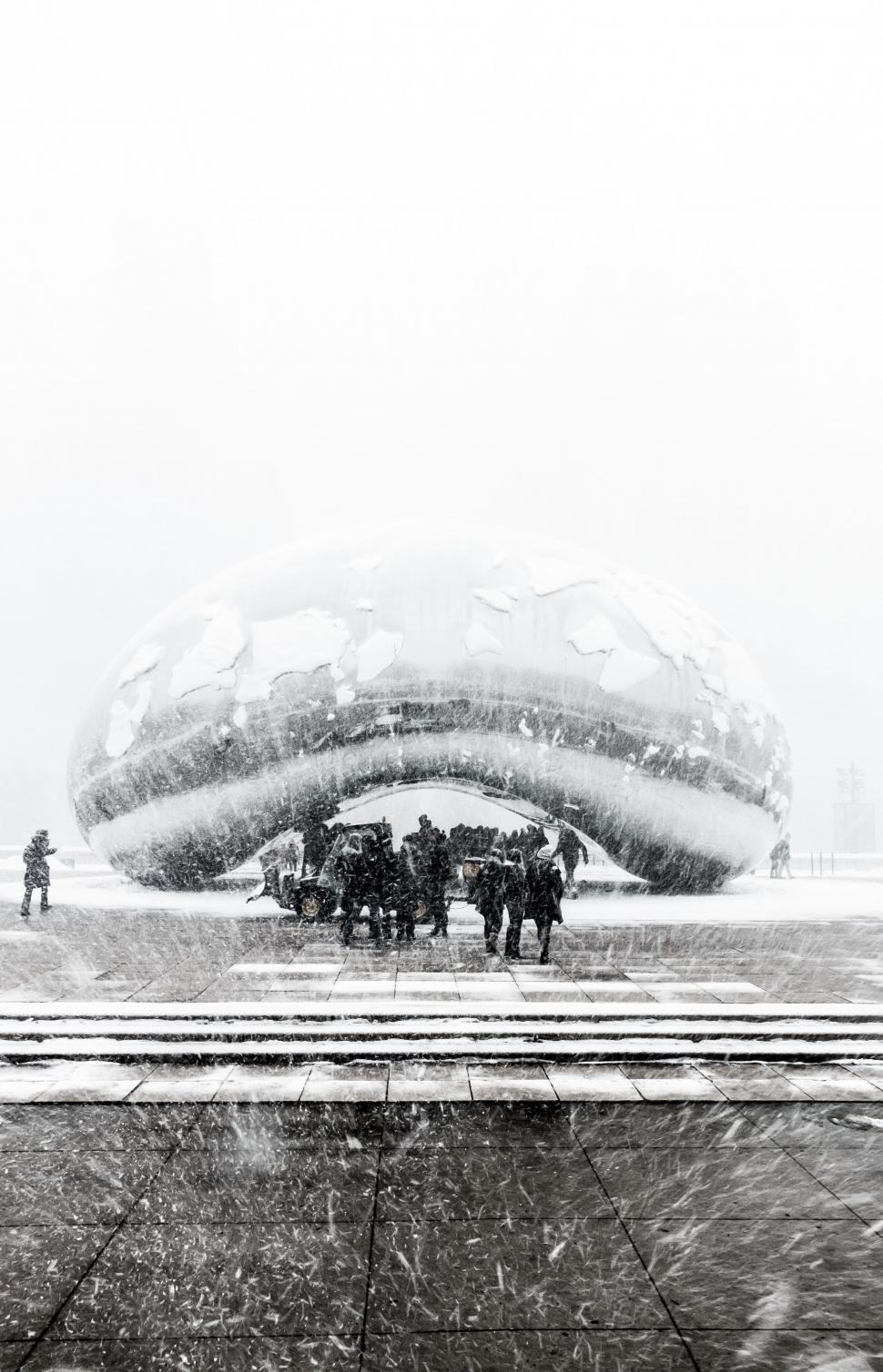 Free Image of People Walking in the Snow 