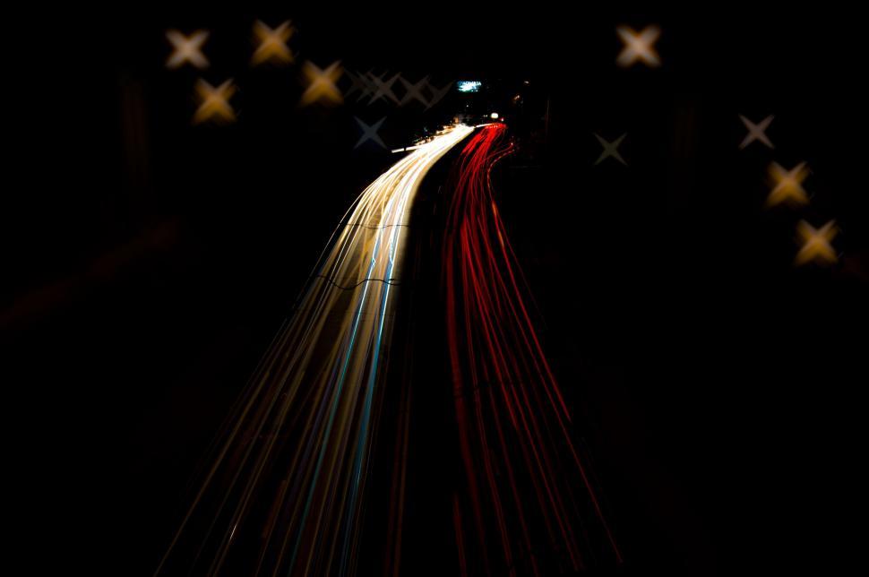 Free Image of Train Passing on Track in Night Long Exposure 