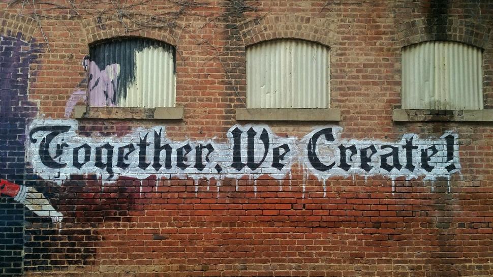 Free Image of Graffiti-Adorned Brick Building 