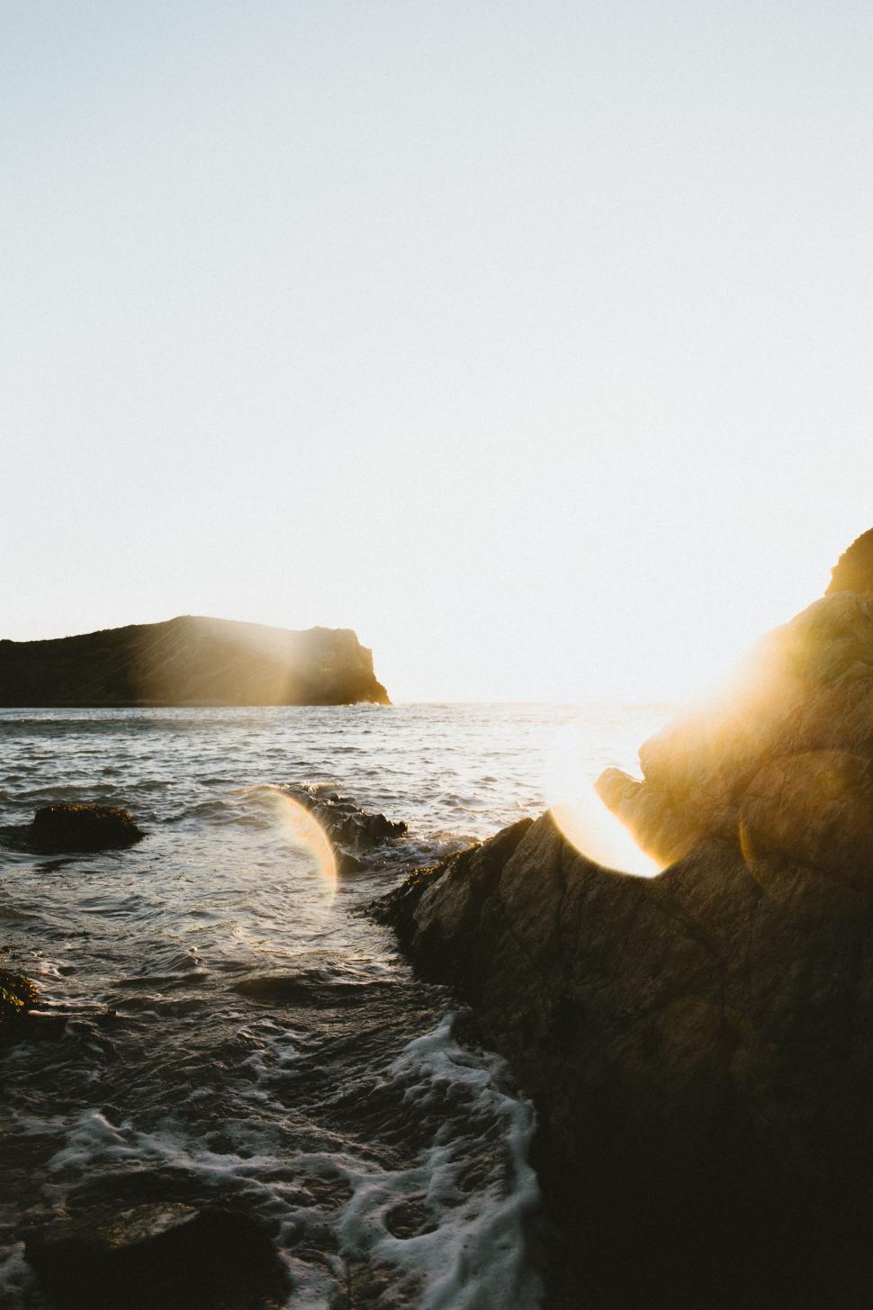 Free Image of Rocks in Foreground of Water Body 