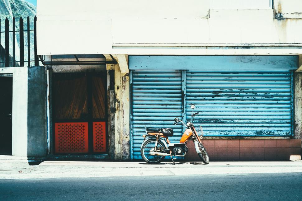 Free Image of Motorcycle Parked on Side of Street 