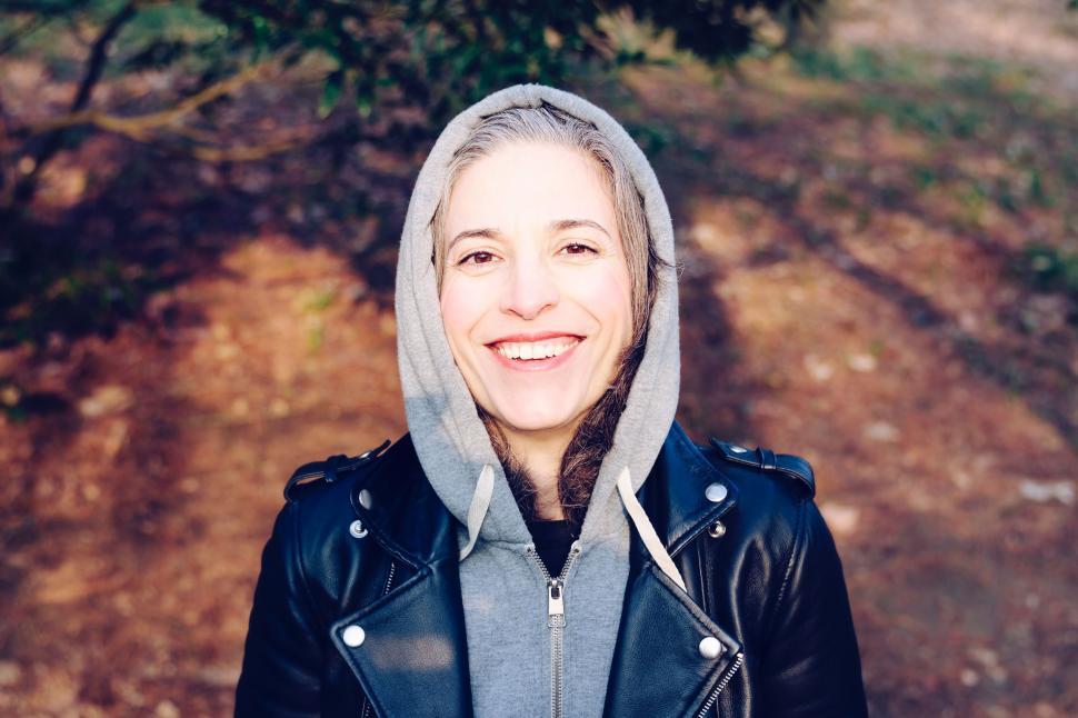 Free Image of Woman Wearing Black Jacket and Hoodie 