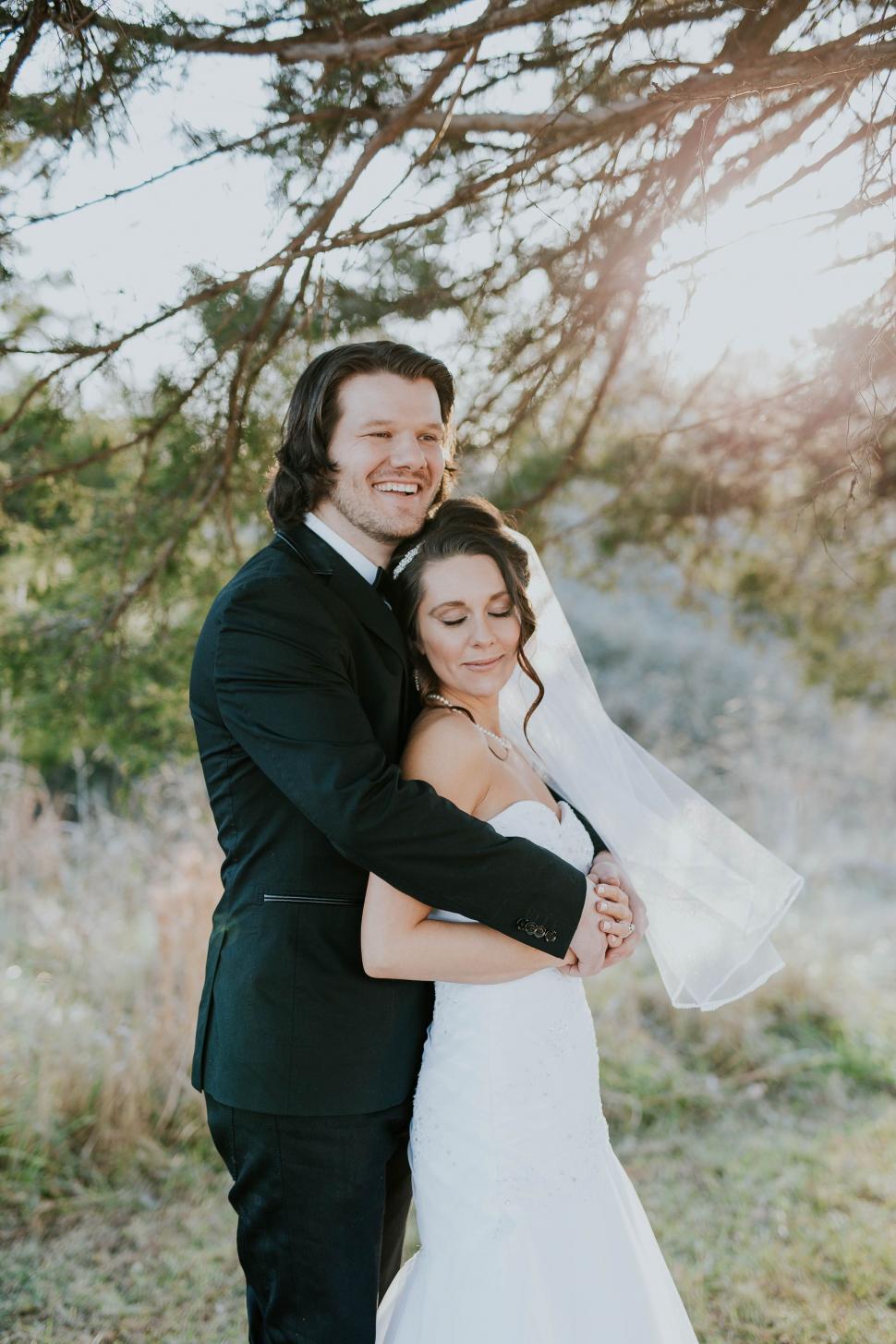 Free Image of Bride and Groom Posing for Wedding Photo 