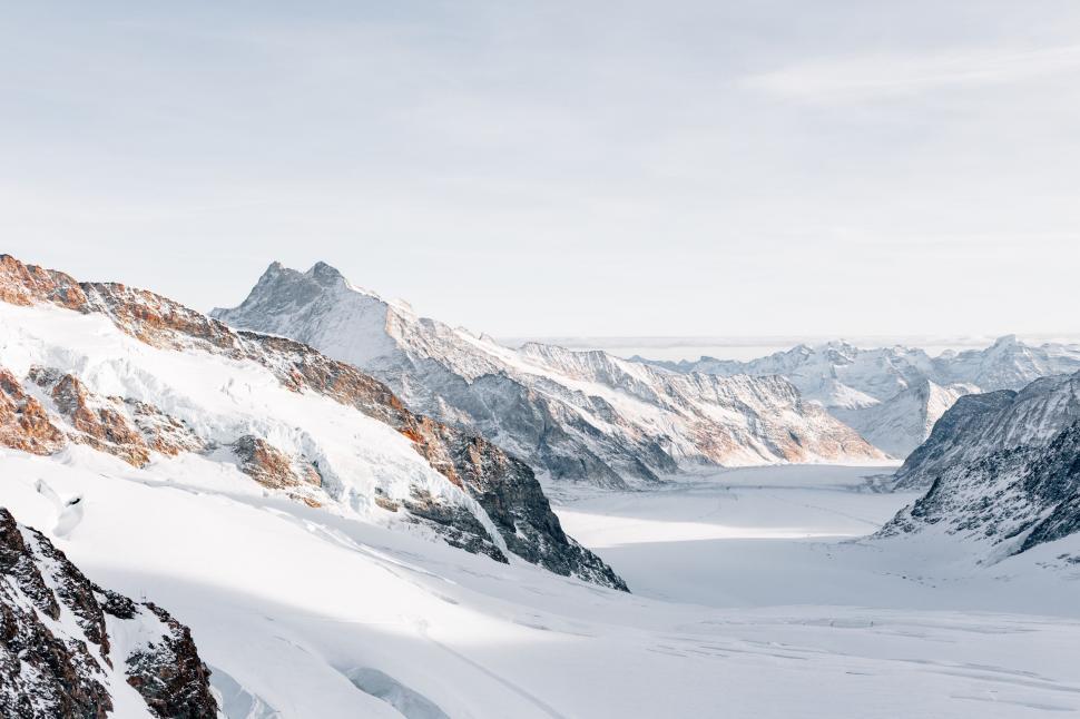 Free Image of Snow Covered Mountain With Lake 
