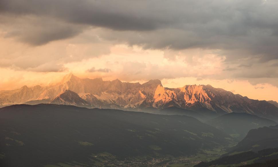 Free Image of Cloudy Sky Over Mountain Range 