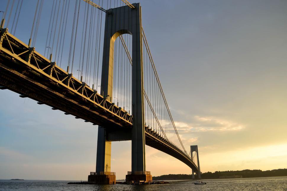 Free Image of Massive Bridge Extending Over Vast Body of Water 