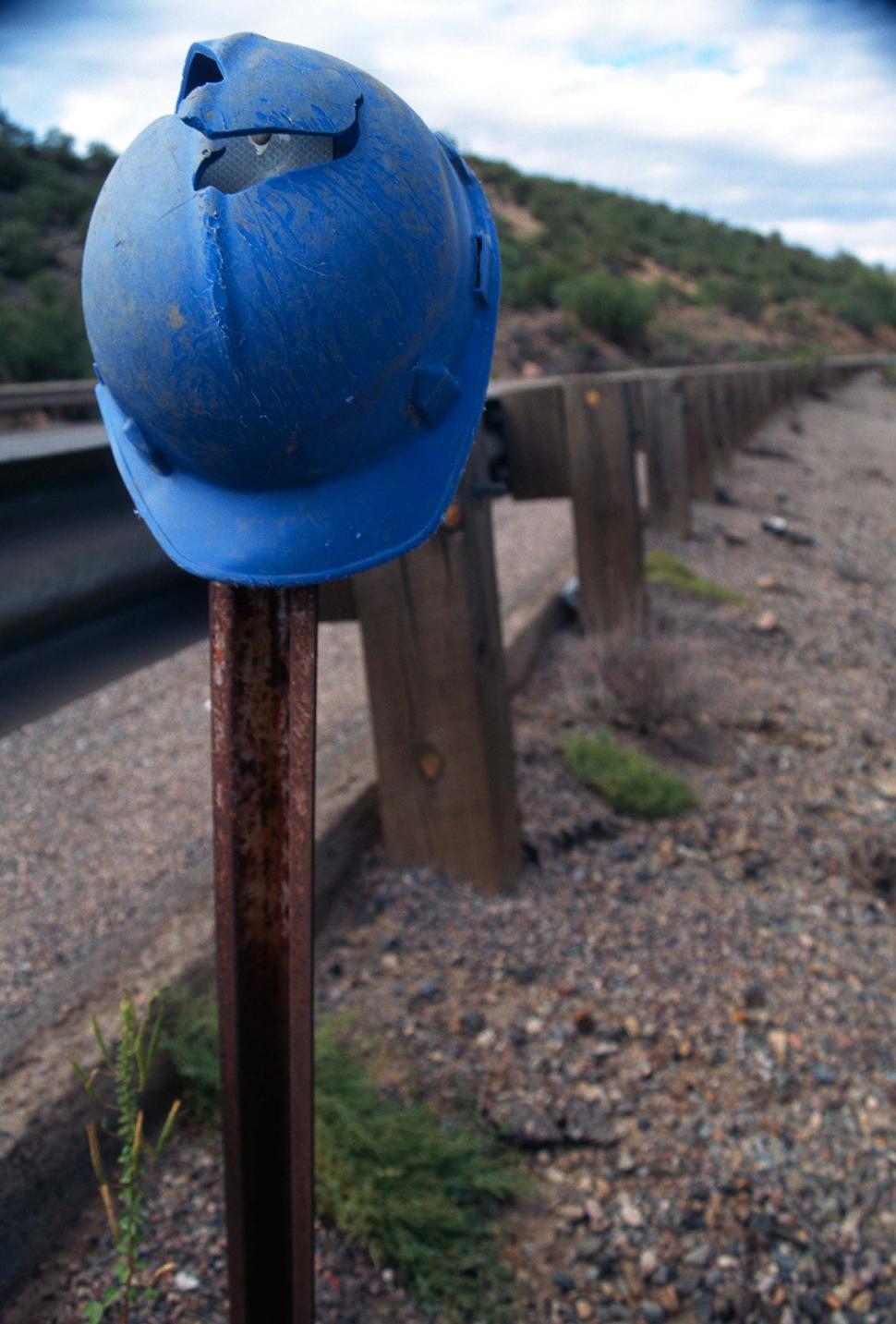 Free Image of Hardhat on a post 