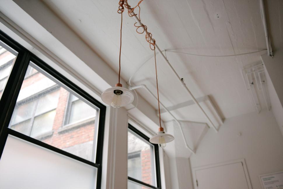 Free Image of Room With Ceiling Fan and Window 