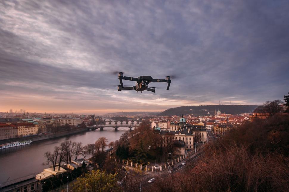 Free Image of Large Remote Controlled Drone Flying Over City 
