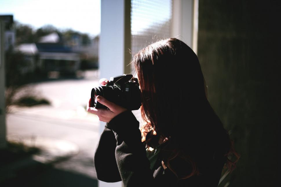 Free Image of Woman Taking Selfie With Camera 