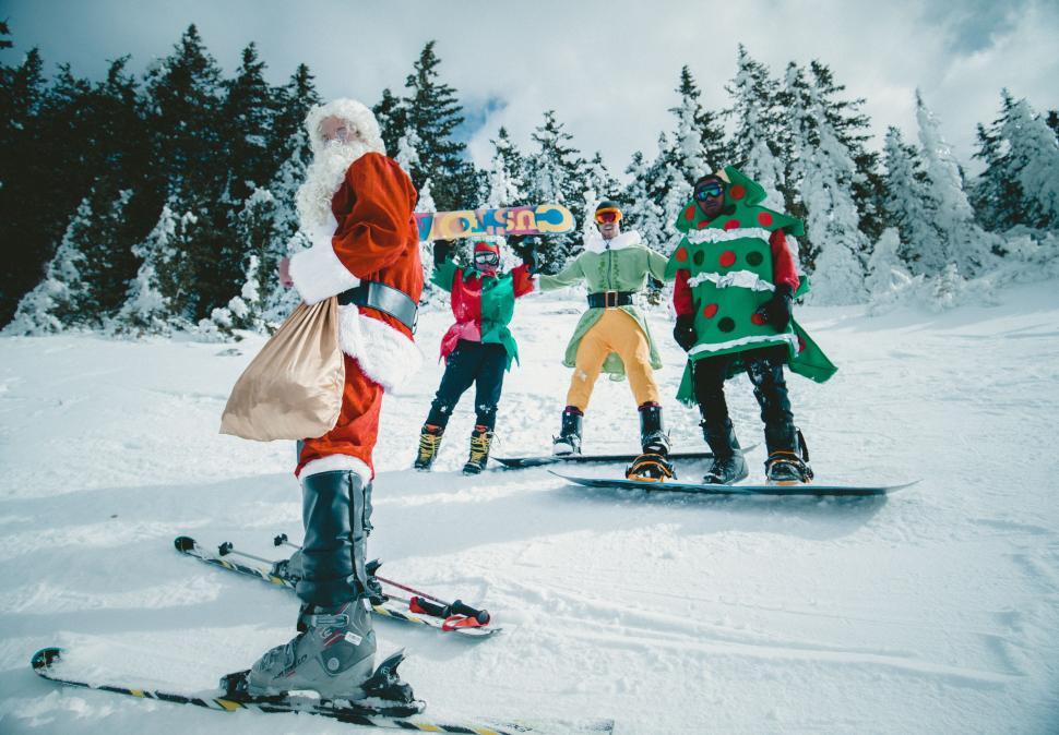 Free Image of Group of People Skiing in the Snow 
