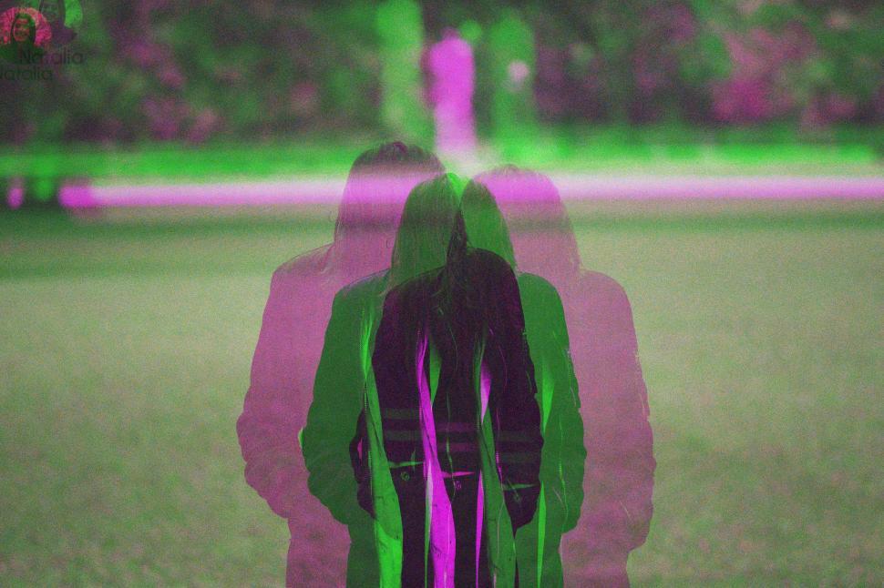 Free Image of Blurry Figure Standing in Field 