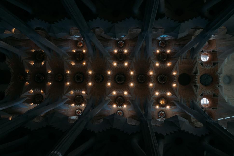 Free Image of Clock Tower Illuminated With Numerous Lights 