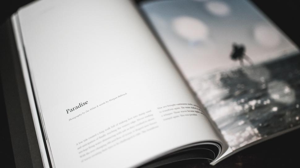 Free Image of Open Book on Table 