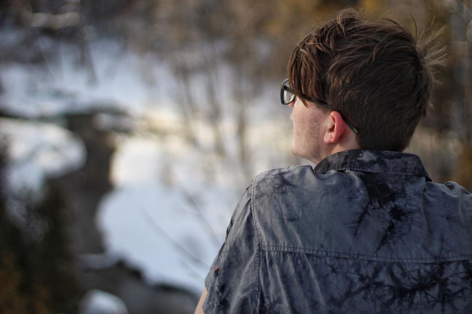 Free Image of Man in Blue Jacket Standing in Snow 