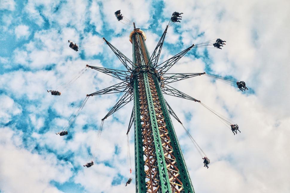Free Image of Tower Surrounded by Flocking Birds 