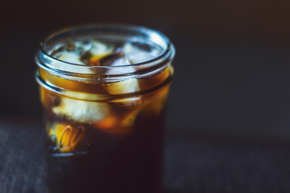 Free Image of Glass Jar Filled With Liquid on Table 