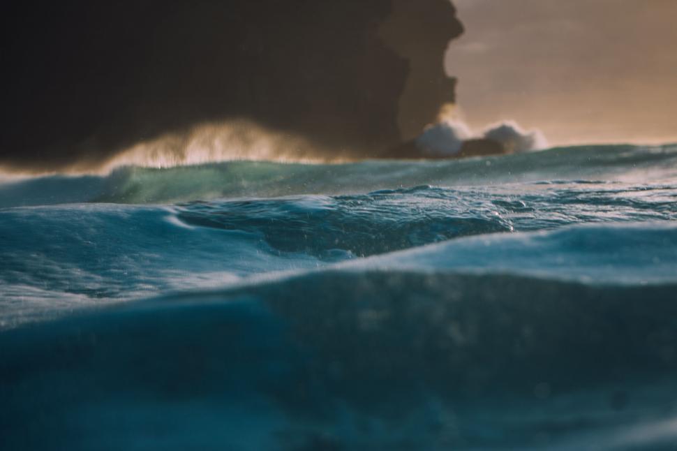 Free Image of Man Riding Surfboard on Top of Wave in Ocean 