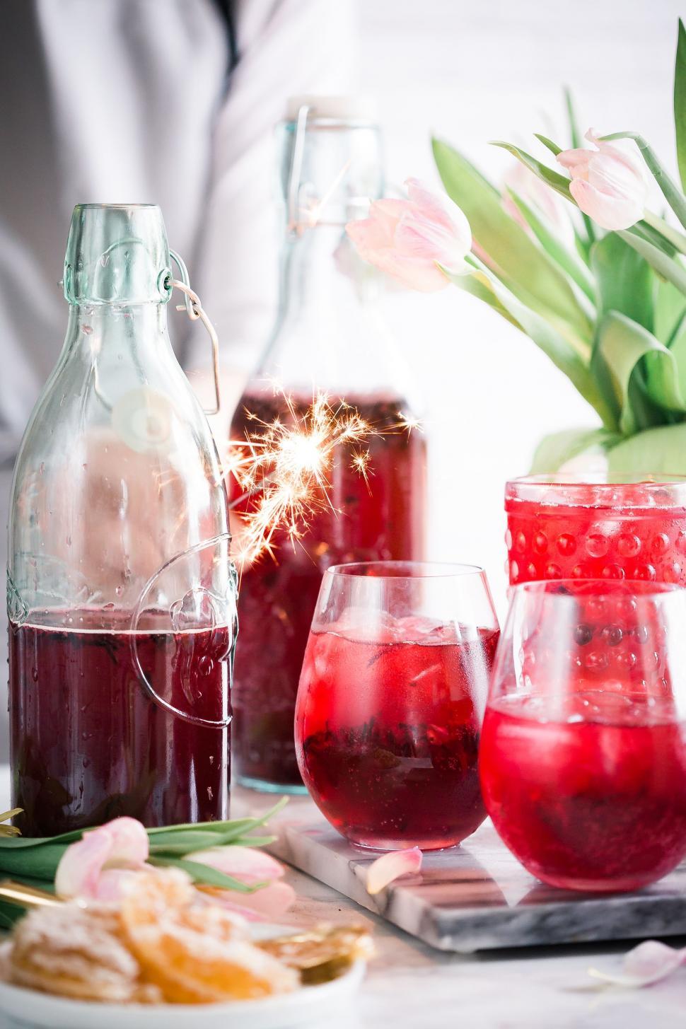 Free Image of Table Topped With Glasses Filled With Liquid 
