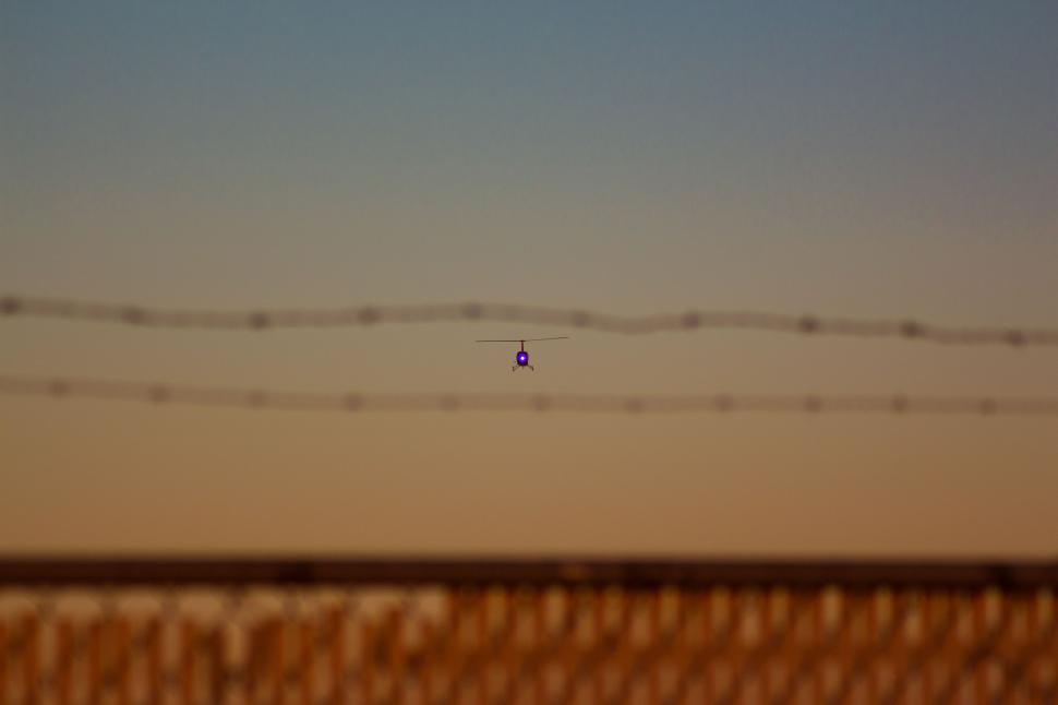 Free Image of Plane Flying Over Field 