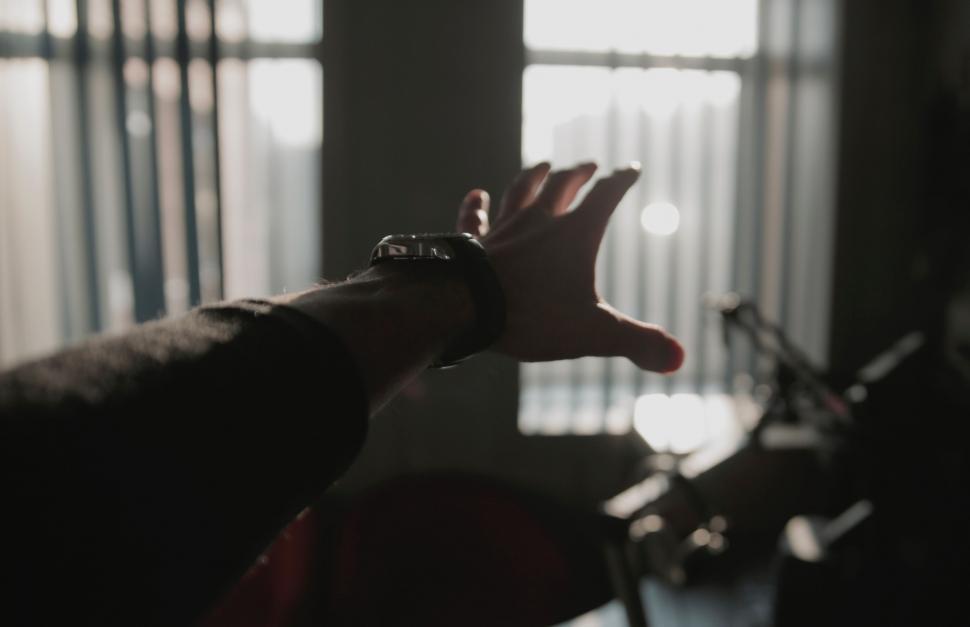 Free Image of Person Holding Out Hand in Black and White 