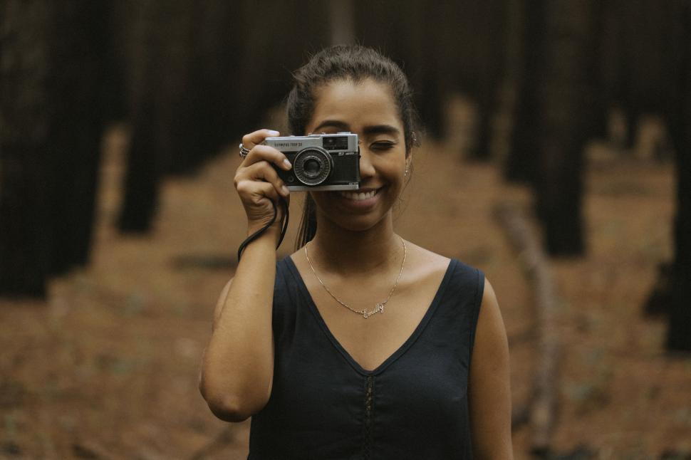 Free Image of Woman Taking Selfie With Camera 