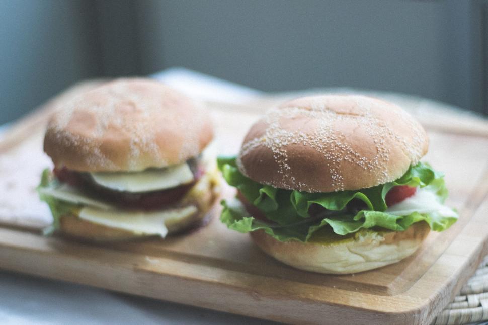 Free Image of Sandwiches on Wooden Cutting Board 