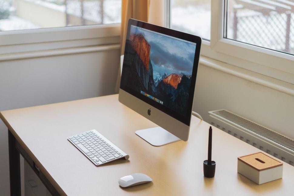 Free Image of Desktop Computer on Wooden Desk 