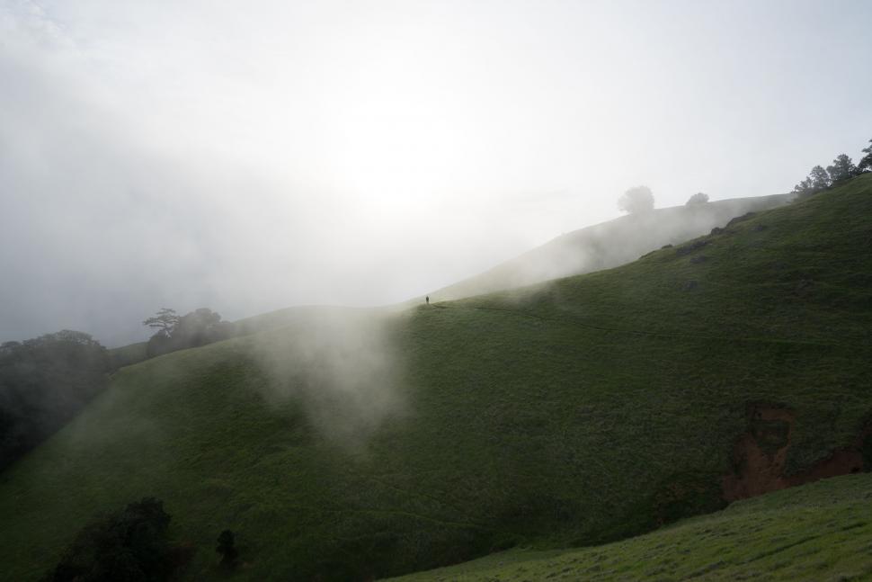 Free Image of Person Riding Snowboard Down Hill 