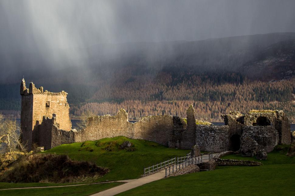 Free Image of Majestic Castle on Green Hillside 