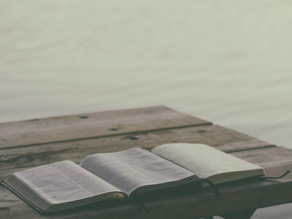 Free Image of Open Book on Wooden Table 