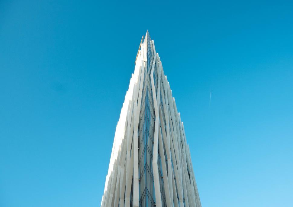 Free Image of Towering Skyscraper Against Sky Background 