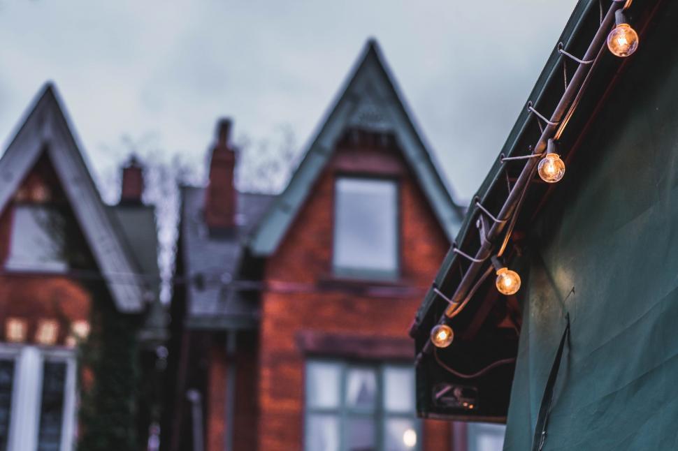 Free Image of House With Bright Lights on the Front 