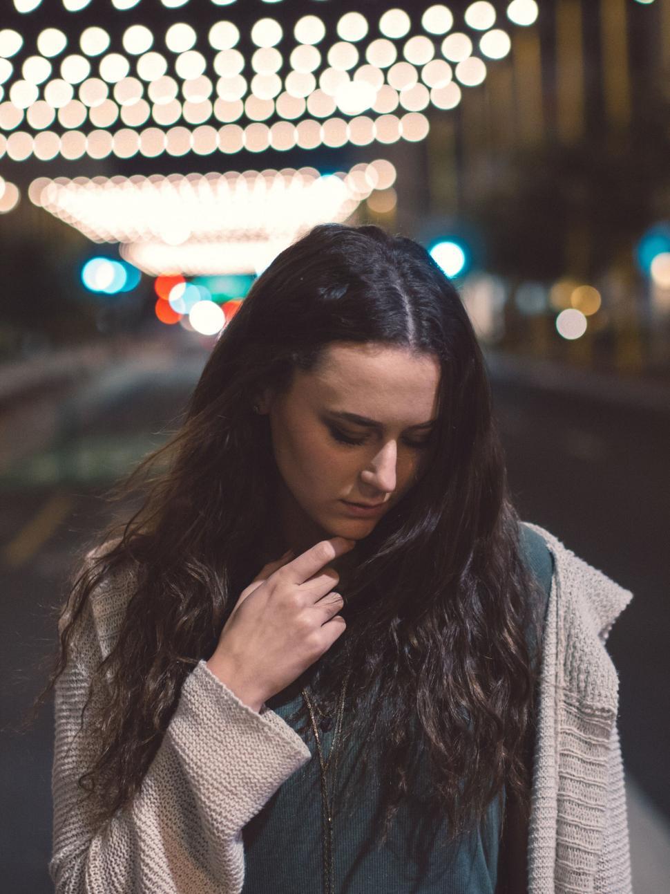 Free Image of Woman Standing on Night Street 