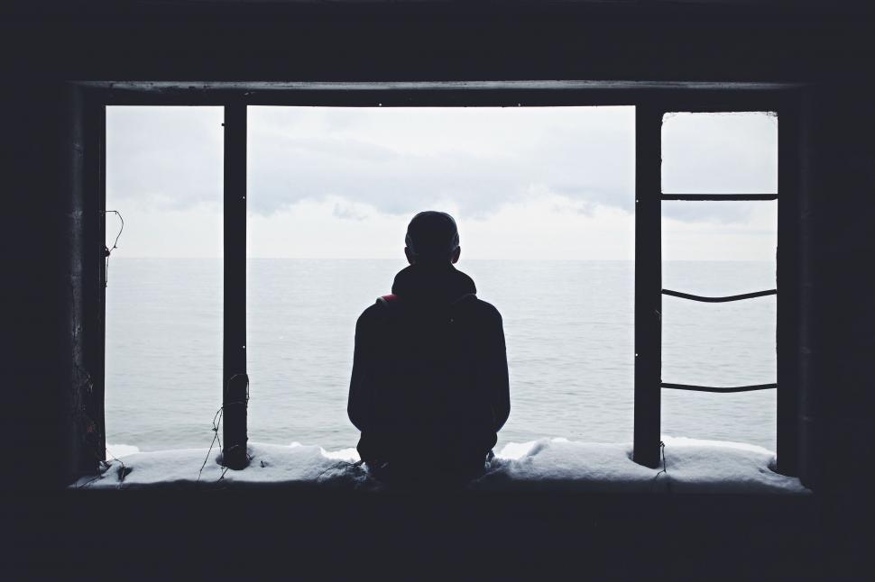 Free Image of Person Standing in Front of an Open Door 