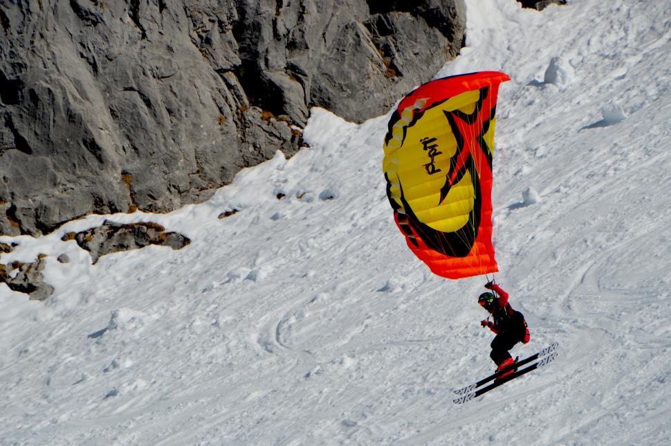 Free Image of Man Skiing Down Snow-Covered Slope 