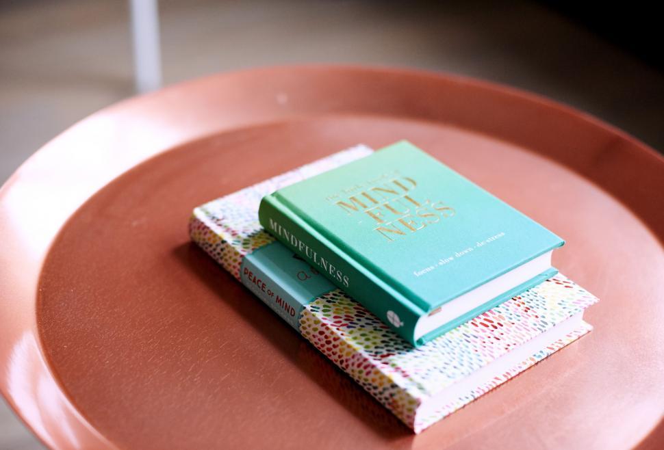 Free Image of Two Books on Red Table 