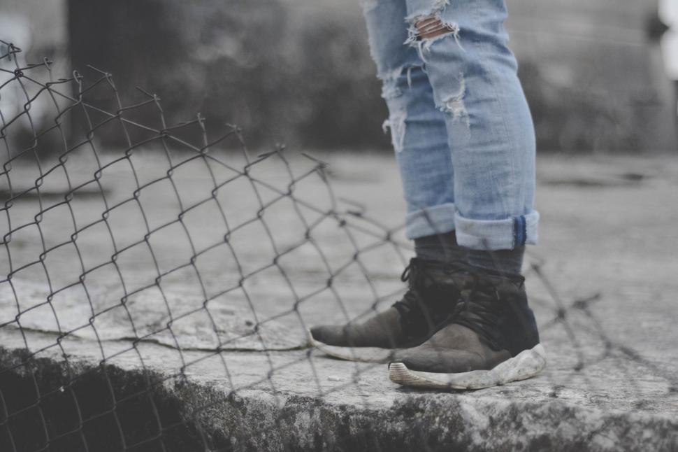 Free Image of Person Standing on Ledge 