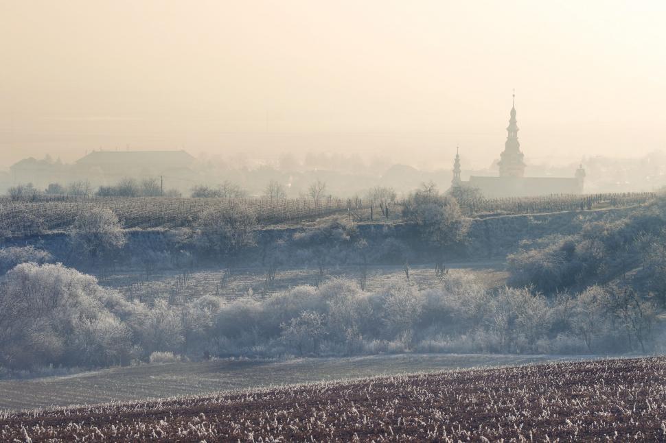 Free Image of Foggy Landscape With Distant Church 