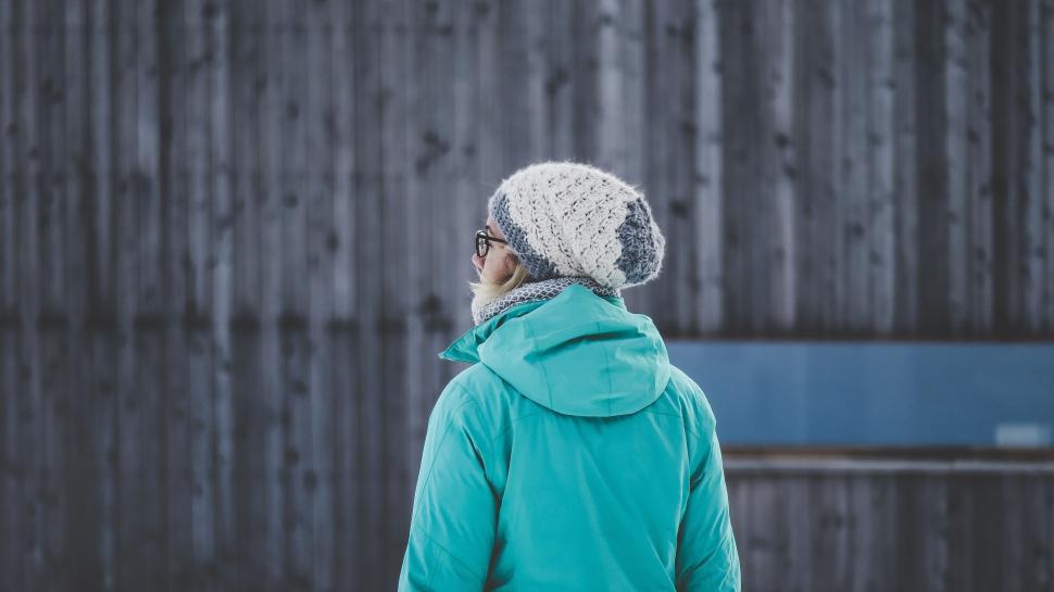 Free Image of Person Standing in Front of Building 