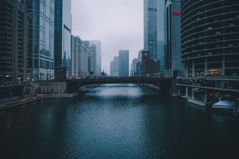 Free Image of Urban Skyline Reflecting in Water 