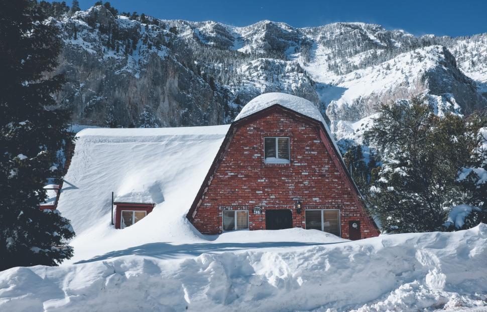 Free Image of Red Barn in Snowy Mountain 